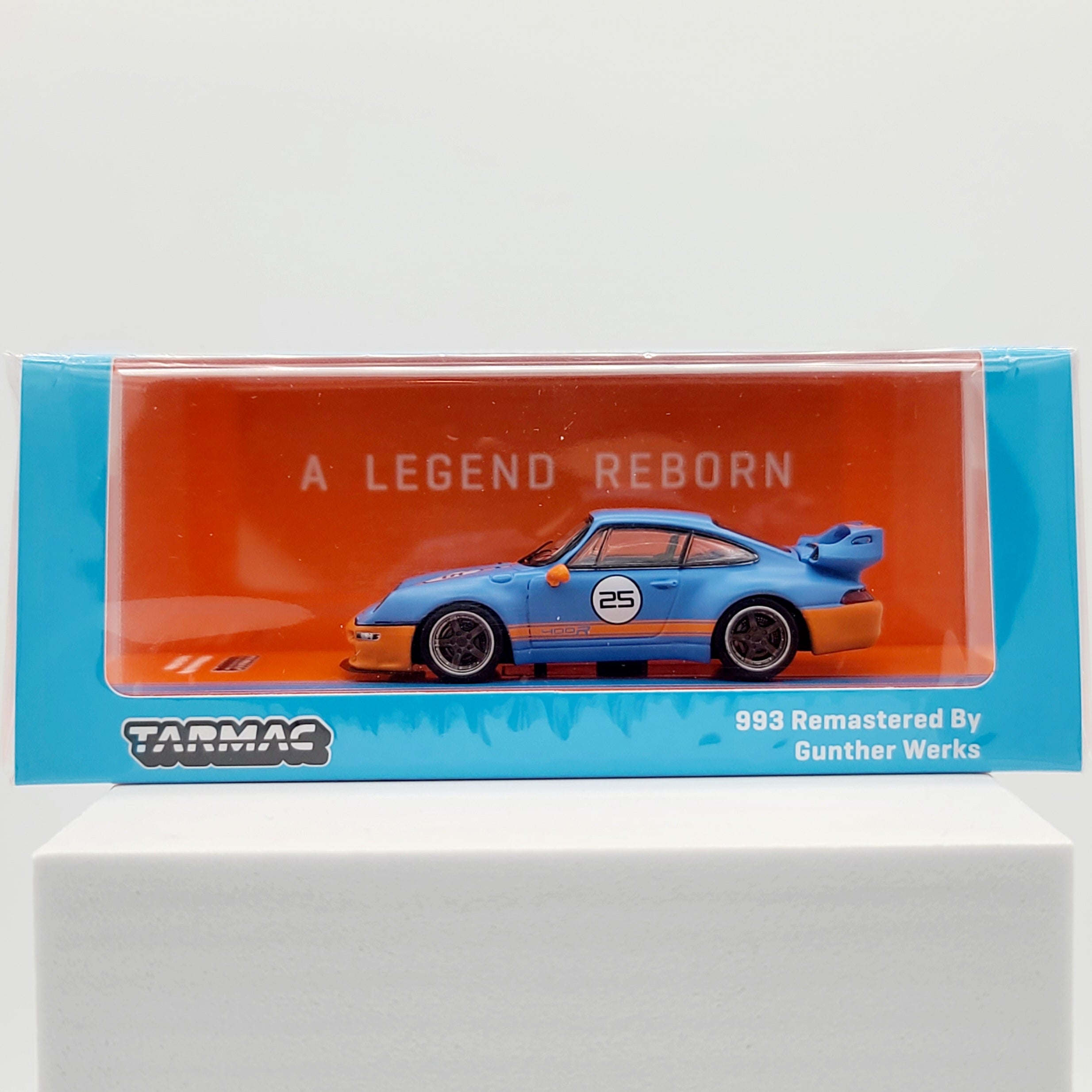 Tarmac Works Porsche 993 Remastered by Gunther Werks - 1:64 scale, blue/orange (2024 Hobby64)
